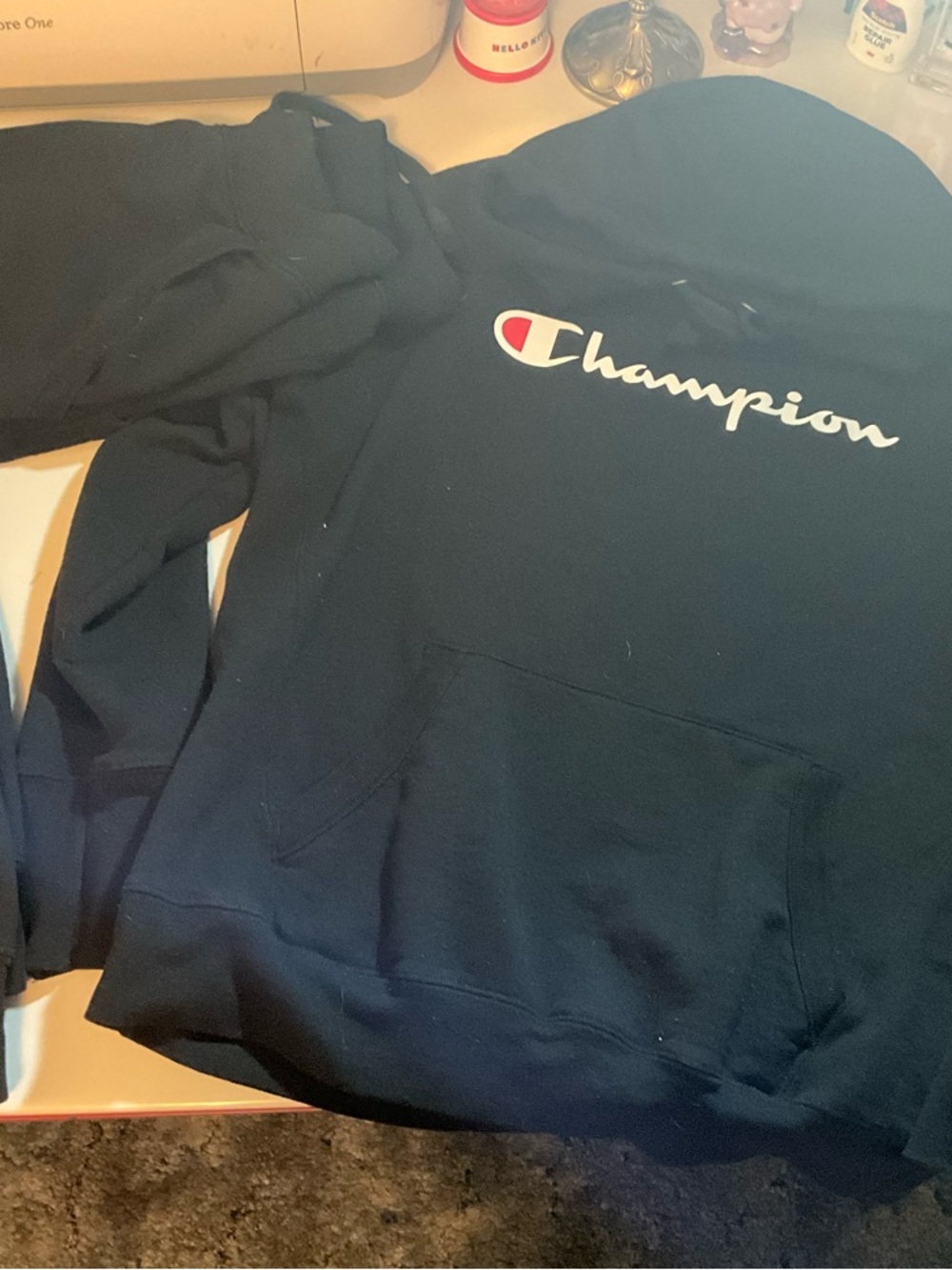 Champion Black Hoodie with White Script and Red Logo Accent